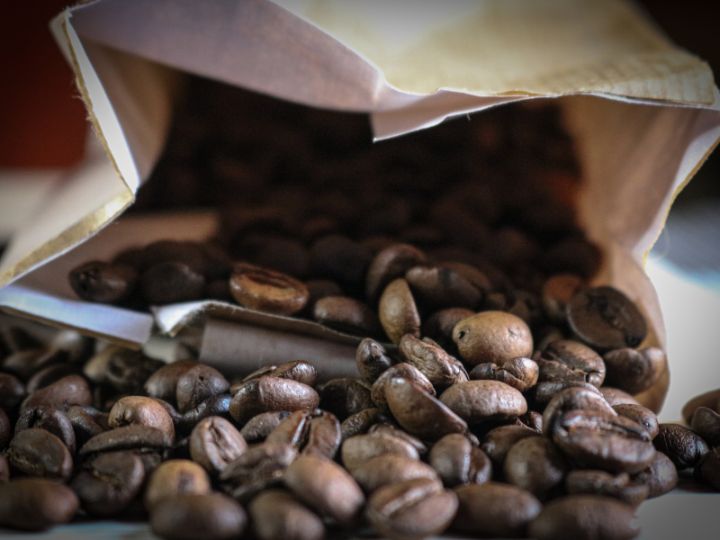 Photo of spilled bag of Beach Bros specialty coffee beans